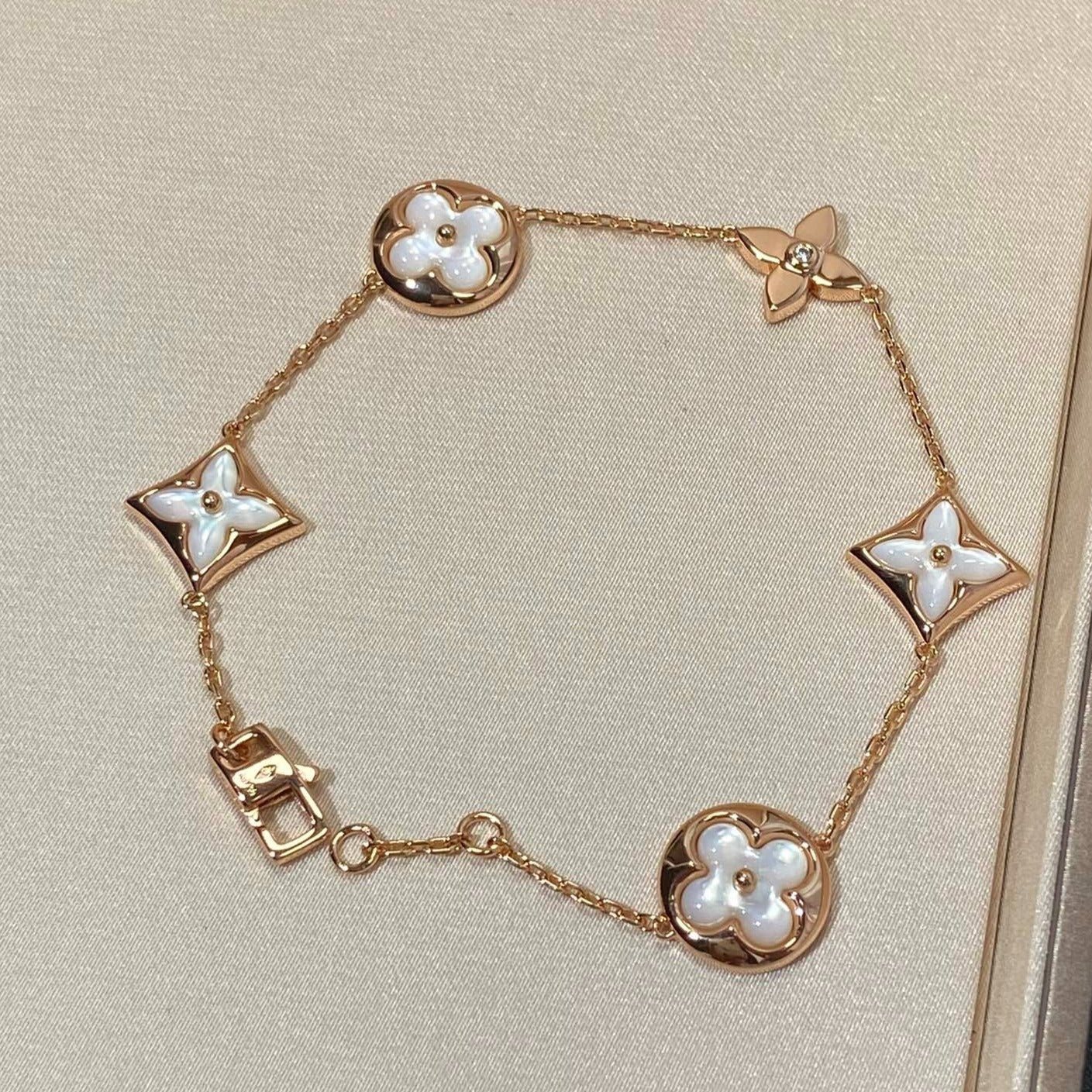 [Am jewelry]STAR AND SUN 5 MOTIF MOP PINK GOLD BRACELET