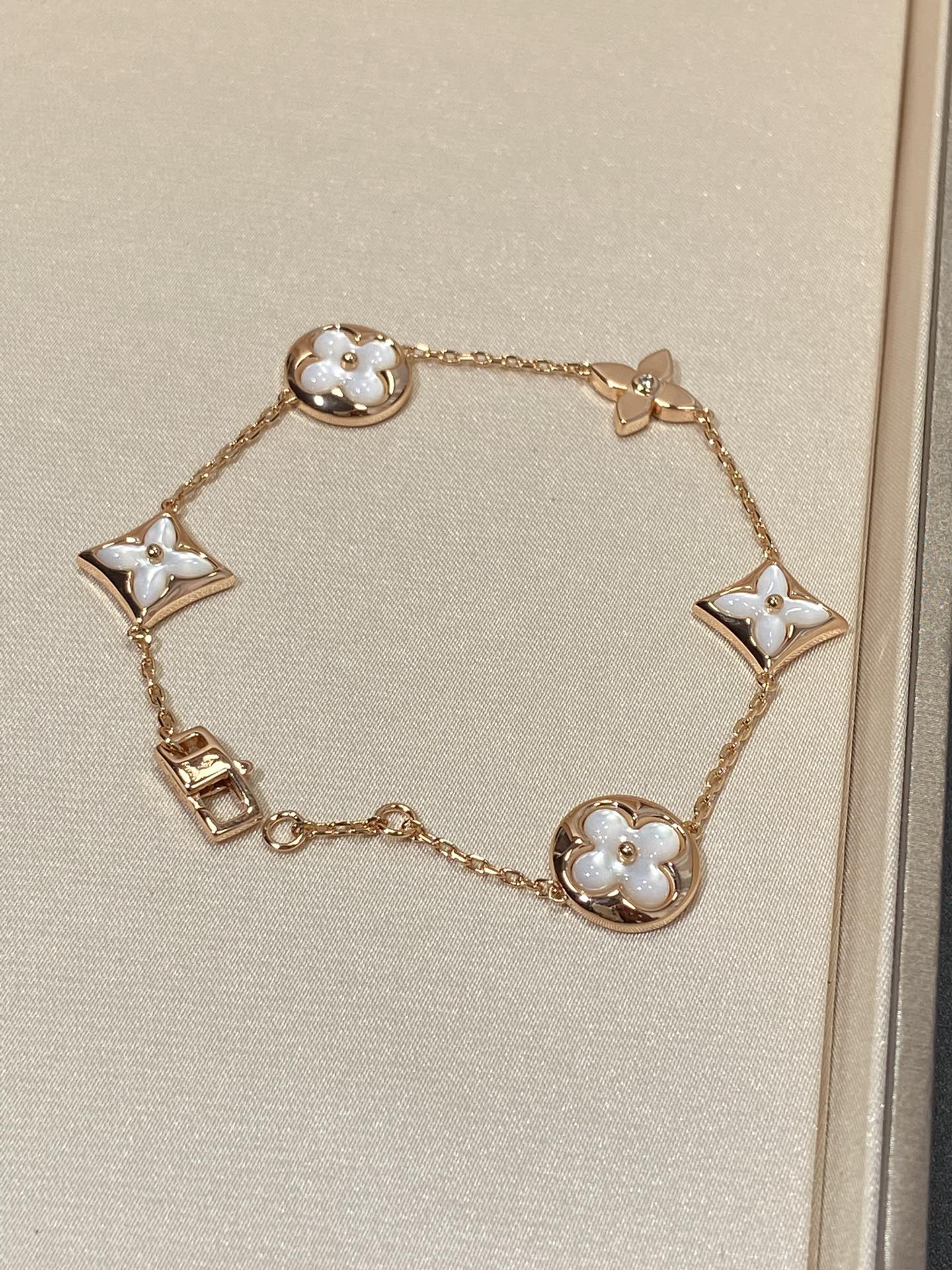 [Am jewelry]STAR AND SUN 5 MOTIF MOP PINK GOLD BRACELET