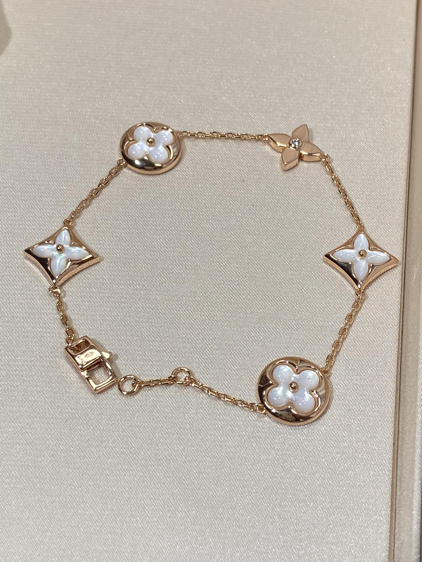 [Am jewelry]STAR AND SUN 5 MOTIF MOP PINK GOLD BRACELET