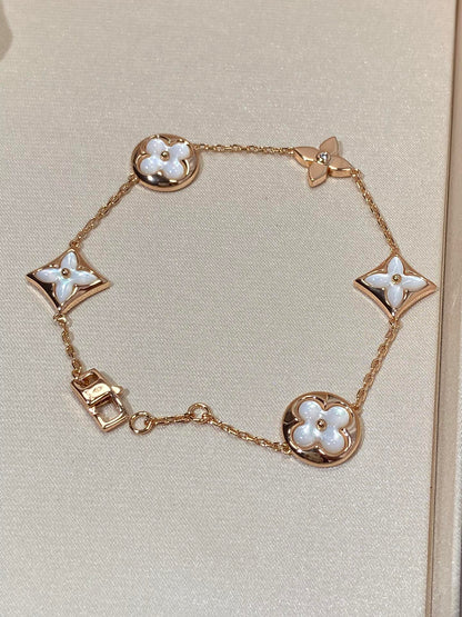 [Am jewelry]STAR AND SUN 5 MOTIF MOP PINK GOLD BRACELET