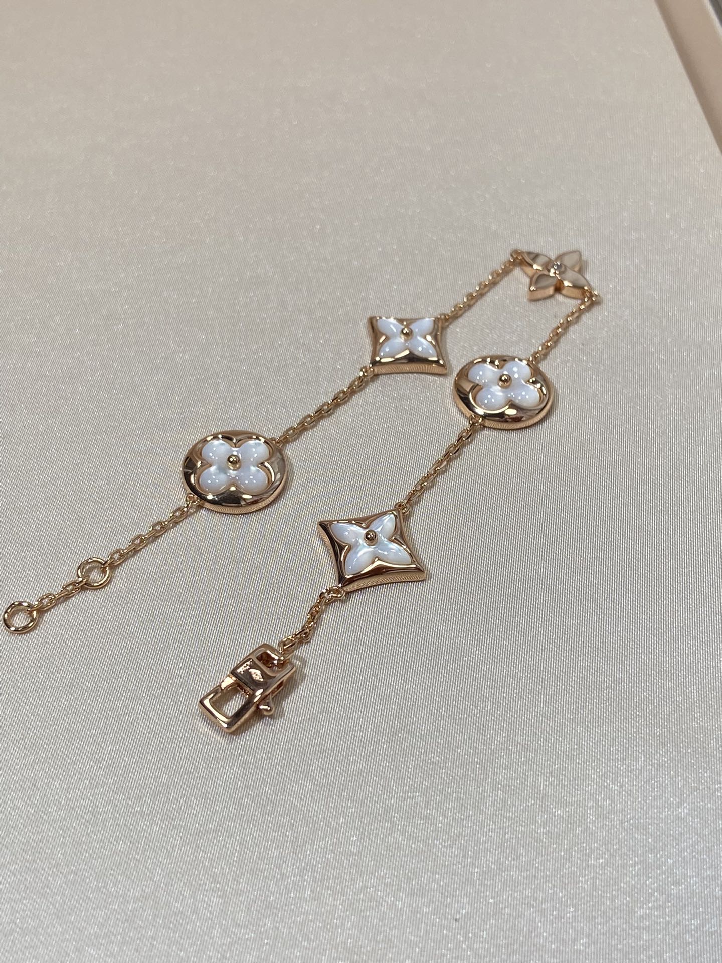[Am jewelry]STAR AND SUN 5 MOTIF MOP PINK GOLD BRACELET