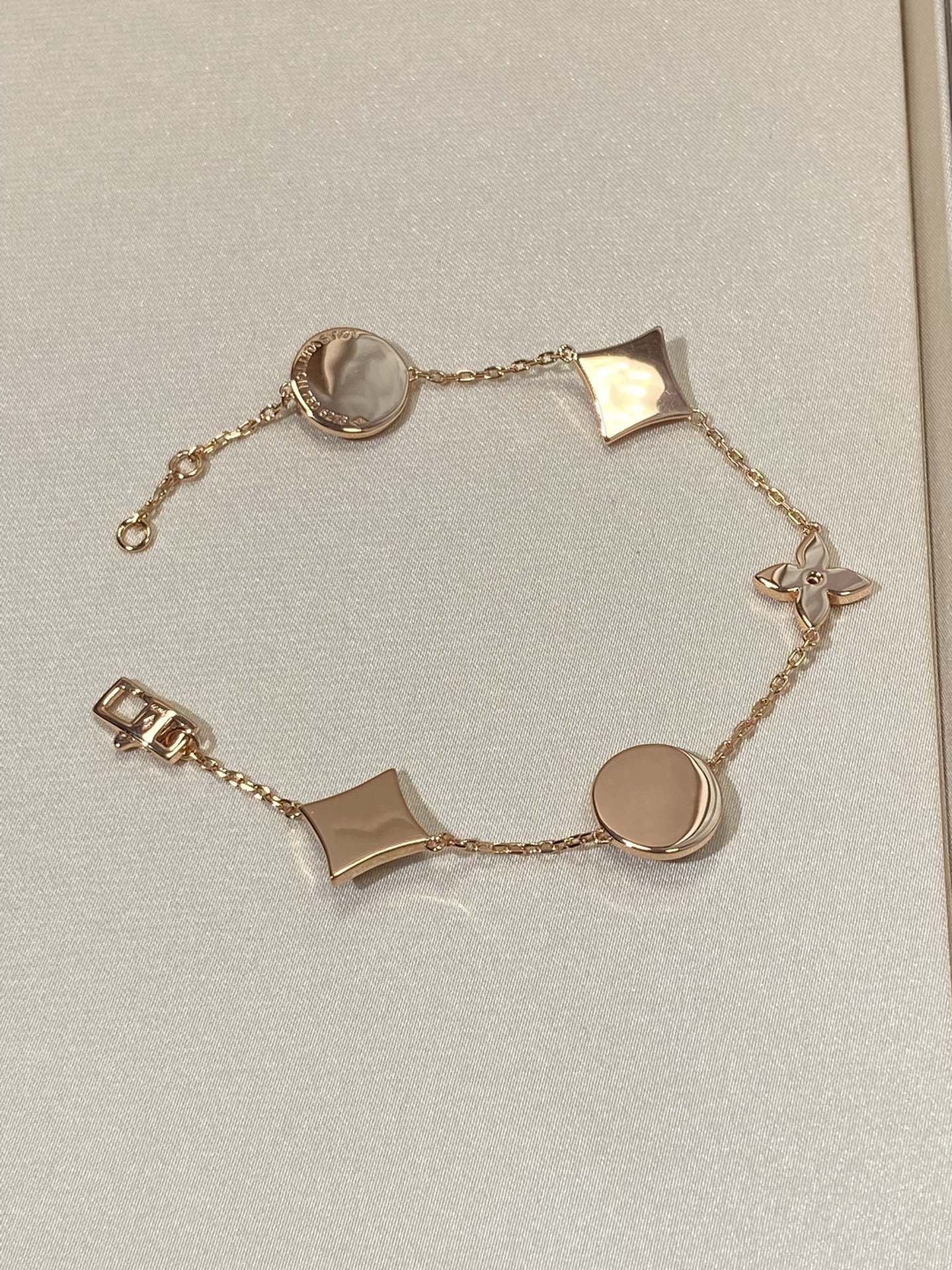 [Am jewelry]STAR AND SUN 5 MOTIF MOP PINK GOLD BRACELET