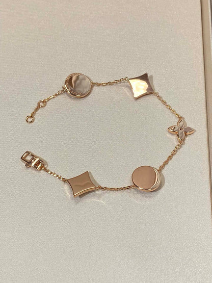 [Am jewelry]STAR AND SUN 5 MOTIF MOP PINK GOLD BRACELET