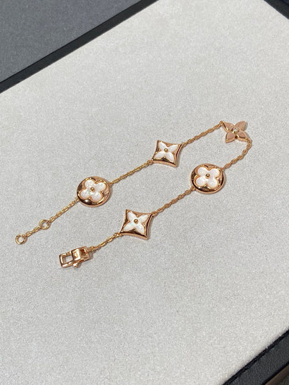[Am jewelry]STAR AND SUN 5 MOTIF MOP PINK GOLD BRACELET