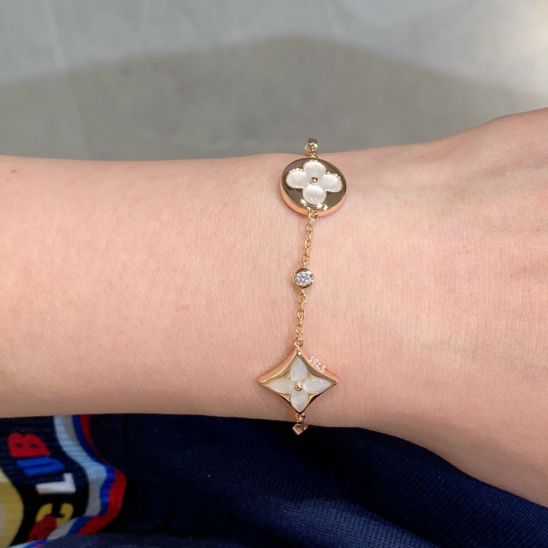 [Am jewelry]STAR AND SUN 4 MOTIF WHITE MOP PINK GOLD BRACELET