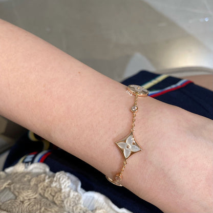 [Am jewelry]STAR AND SUN 4 MOTIF WHITE MOP PINK GOLD BRACELET