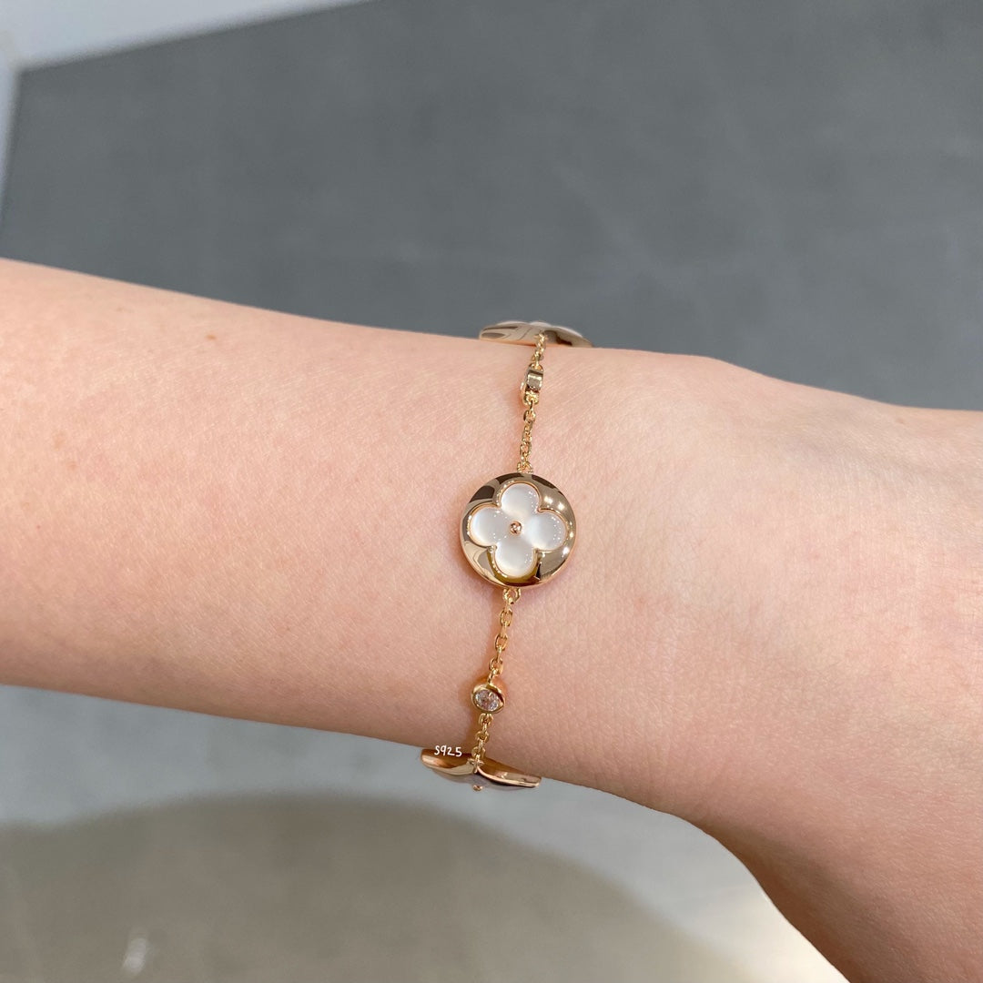 [Am jewelry]STAR AND SUN 4 MOTIF WHITE MOP PINK GOLD BRACELET