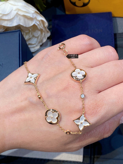 [Am jewelry]STAR AND SUN 4 MOTIF WHITE MOP PINK GOLD BRACELET